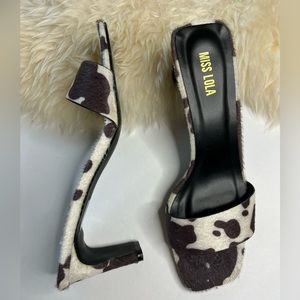Cow print mules
